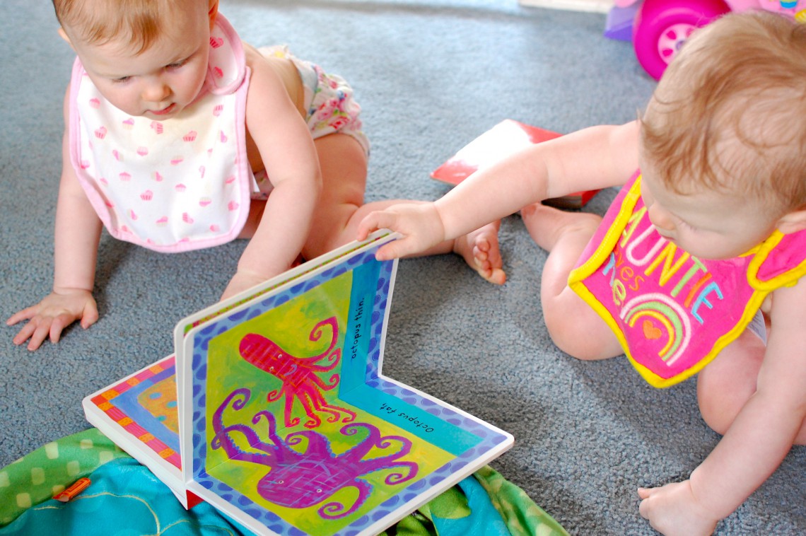 Eventually they both ended up sharing (fighting over) the book. Kids.