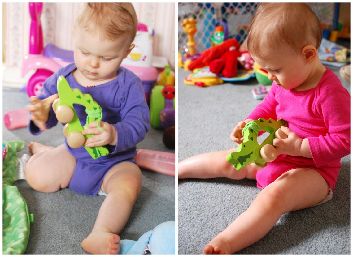 Carefully studying their new toy.