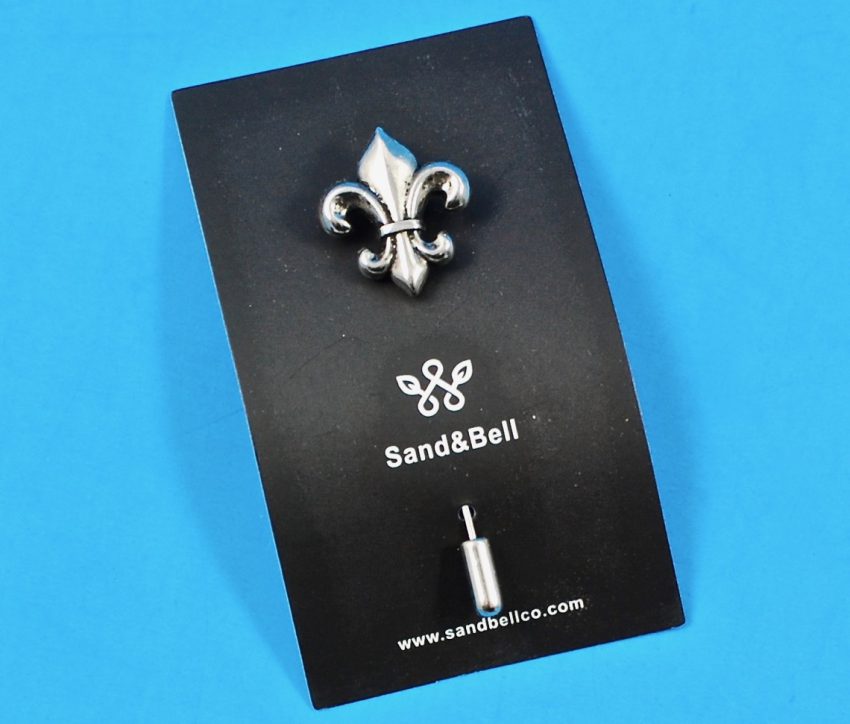 Sand & Bell lapel pin